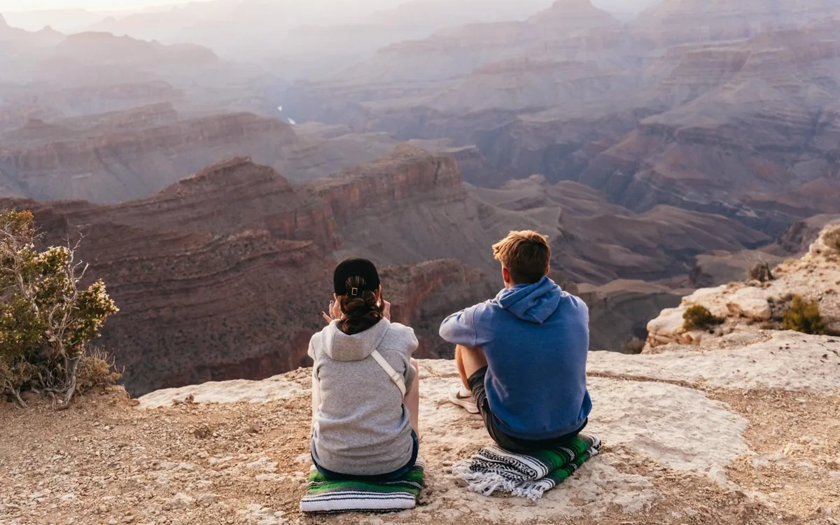 The Grand Canyon rim under afternoon cloud