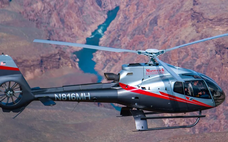 A helicopter over the Colorado River in the Grand Canyon